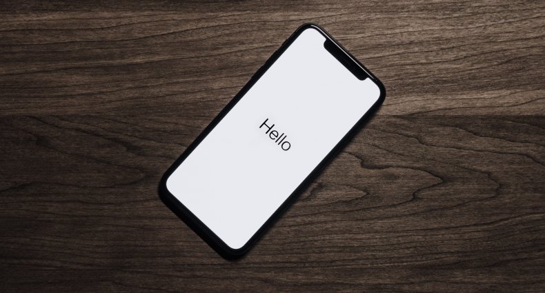iPhone with hello on screen