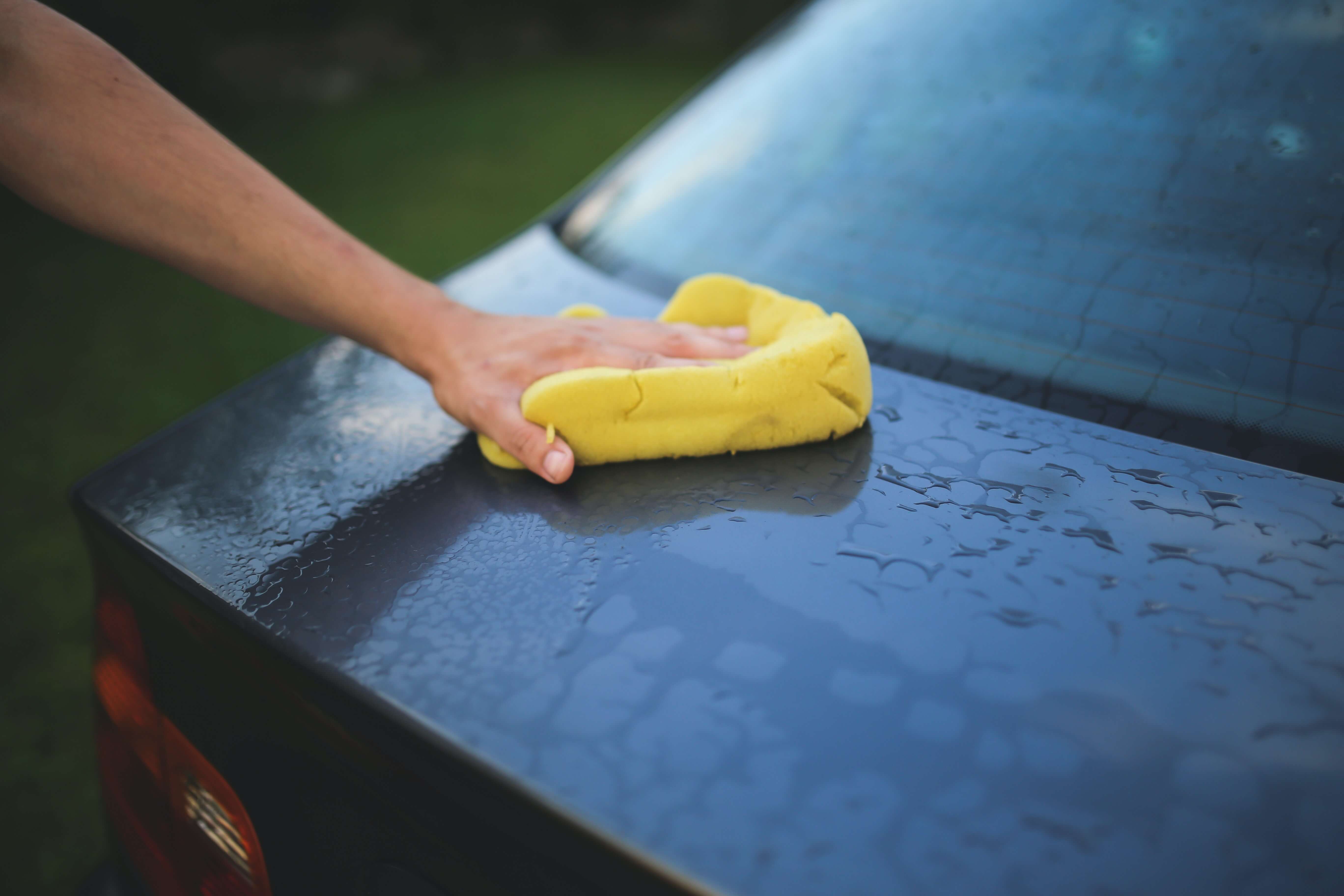 washing-a-car-with-a-sponge